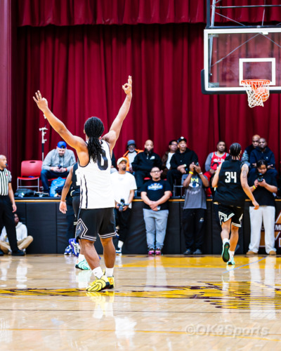 FORESTVILLE, Md. — Devin Toatley raises his arms in celebration after assisting on a three-pointer during the Lethal Shooter All-Star Game at Bishop McNamara High School. Photo by Olen Kelley III/OK3Sports.