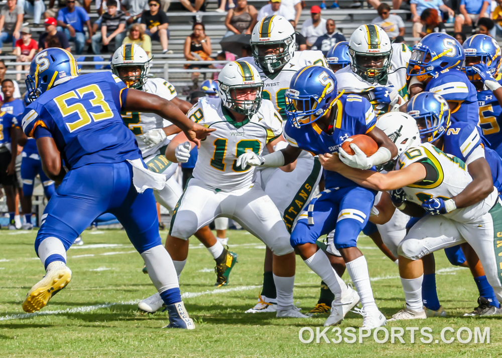 FOOTBALL OSCAR SMITH 41, WEST FORSYTH 26 Tigers win with strong first