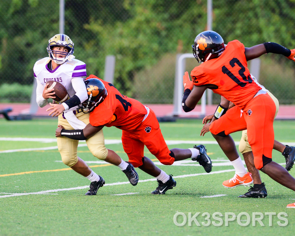 FOOTBALL: Withrow 60, Thurgood 6: Tigers run pass Cougars in season opener
