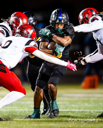 Wise senior Kameron Parker breaks through a tackle on his way to a 26-yard gain in the second quarter. Wise Pumas, Suitland Rams, Eric Wedge III, Kameron Parker, Sergio Torrico, Xavier Reed, Bryce Ballard, Ashton Early, Theodore Riley, Keon Elder, Landon Cooper, Dante Gayle, Les Williams, O. Babalola, Wayne Agnew, high school football, Prince George’s County, Upper Marlboro MD, OK3Sports, 2025-2026 season, Wise vs Suitland, Wise football, Pumas football highlights, Maryland high school sports, PG County football