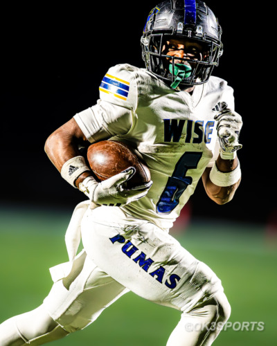 Wise High School senior running back Kameron Parker scores one of his four touchdowns against Northwestern during a 63–0 win on November 1, 2025, in Hyattsville, Maryland.