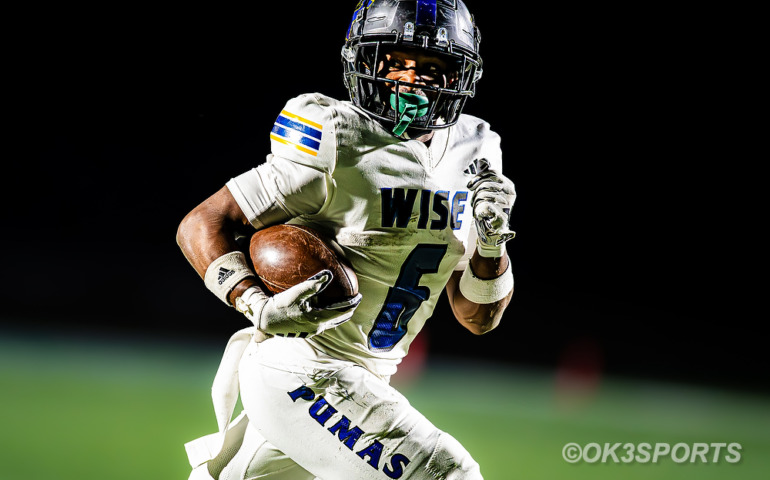 Wise High School senior running back Kameron Parker scores one of his four touchdowns against Northwestern during a 63–0 win on November 1, 2025, in Hyattsville, Maryland.
