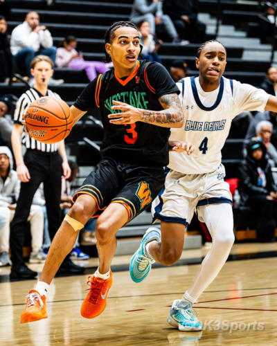 Westlake Wolverines varsity basketball players compete against Springbrook during a 43–42 home win in Waldorf Maryland. Photo by Olen Kelley III OK3Sports.