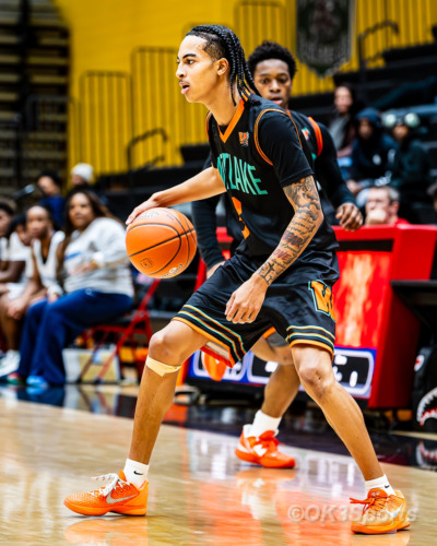Westlake Wolverines varsity basketball players compete against Springbrook during a 43–42 home win in Waldorf Maryland. Photo by Olen Kelley III OK3Sports.
