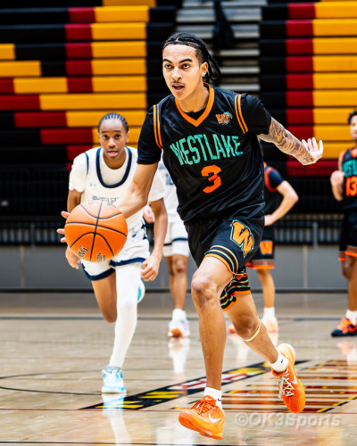 Westlake Wolverines varsity basketball players compete against Springbrook during a 43–42 home win in Waldorf Maryland. Photo by Olen Kelley III OK3Sports.