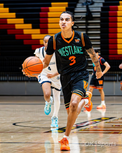 Westlake Wolverines varsity basketball players compete against Springbrook during a 43–42 home win in Waldorf Maryland. Photo by Olen Kelley III OK3Sports.