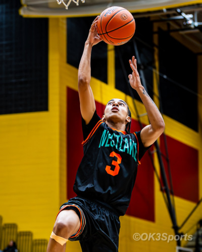 Westlake Wolverines varsity basketball players compete against Springbrook during a 43–42 home win in Waldorf Maryland. Photo by Olen Kelley III OK3Sports.