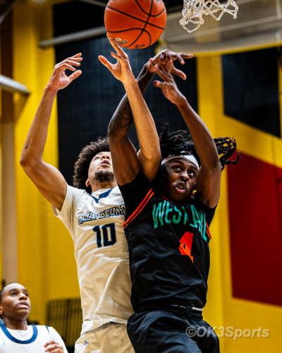 Westlake Wolverines varsity basketball players compete against Springbrook during a 43–42 home win in Waldorf Maryland. Photo by Olen Kelley III OK3Sports.