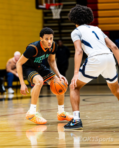 Westlake Wolverines varsity basketball players compete against Springbrook during a 43–42 home win in Waldorf Maryland. Photo by Olen Kelley III OK3Sports.