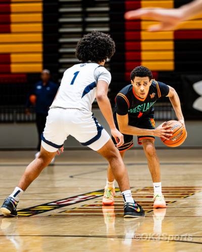 Westlake Wolverines varsity basketball players compete against Springbrook during a 43–42 home win in Waldorf Maryland. Photo by Olen Kelley III OK3Sports.