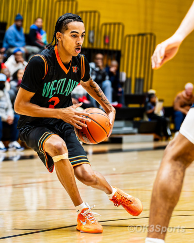 Westlake Wolverines varsity basketball players compete against Springbrook during a 43–42 home win in Waldorf Maryland. Photo by Olen Kelley III OK3Sports.