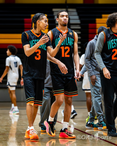 Westlake Wolverines varsity basketball players compete against Springbrook during a 43–42 home win in Waldorf Maryland. Photo by Olen Kelley III OK3Sports.