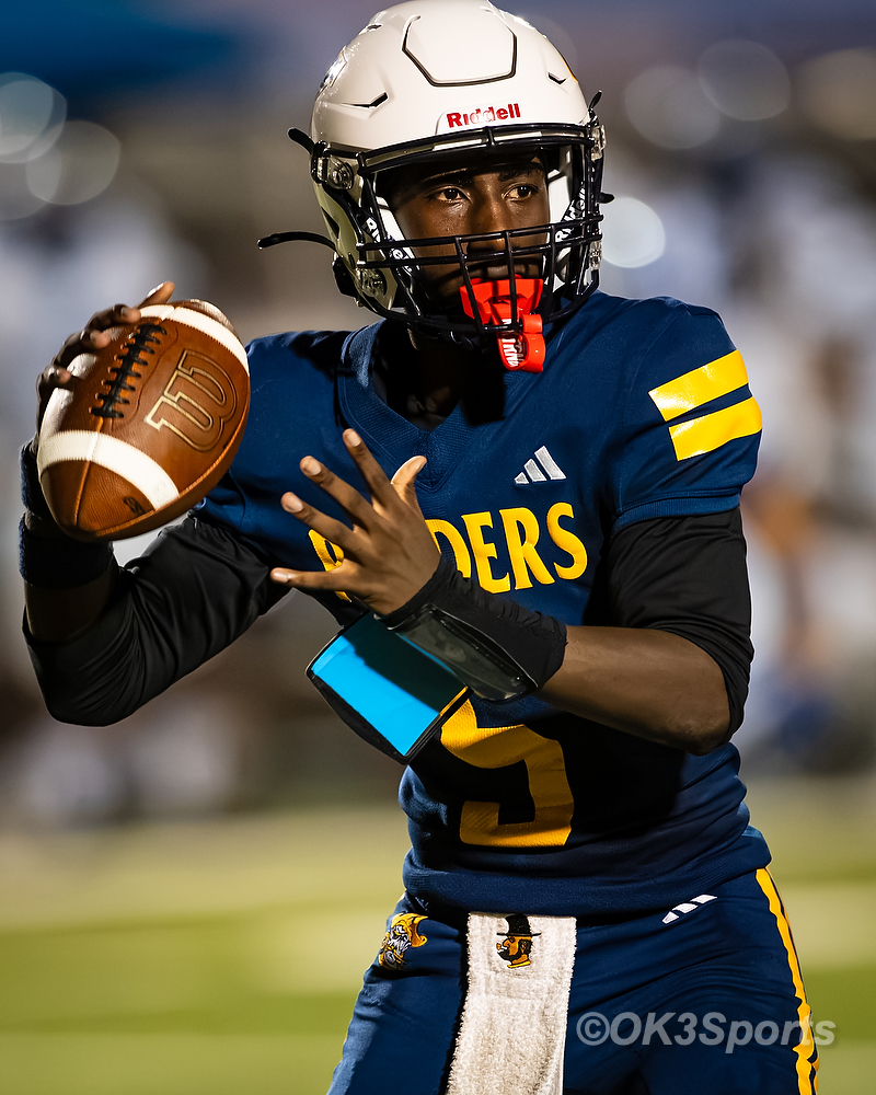 Quarterback Dante Howse throws downfield in the Keenan Airport football matchup