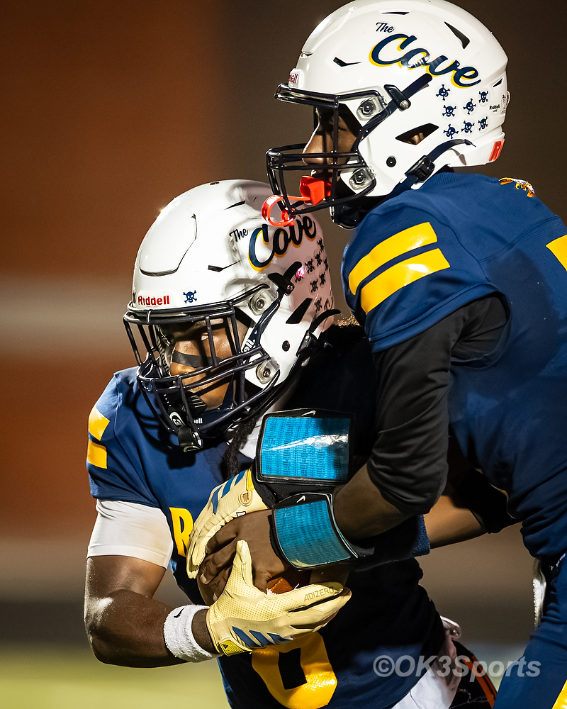Keenan Raiders offense exchanges the football during the Airport football game