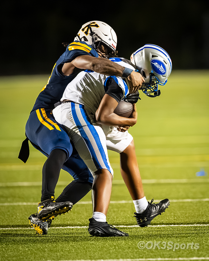 Keenan defender Conrad Hampton sacks Airport quarterback Ameire Lynch