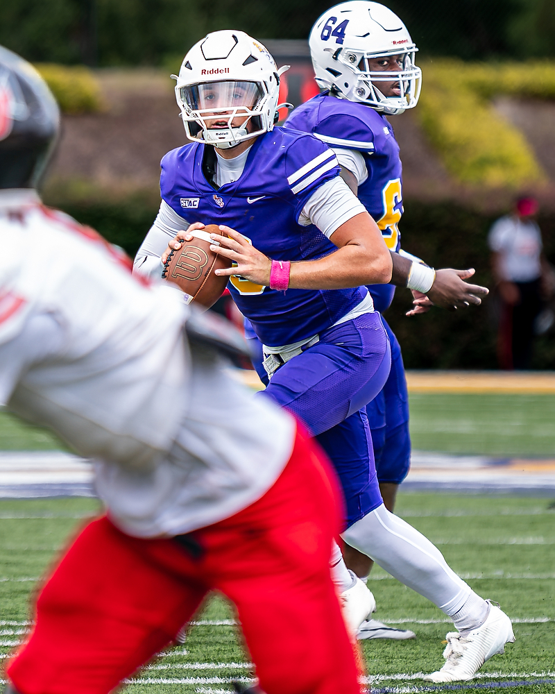 Benedict quarterback Jett Peddy (#8) looks downfield against Clark Atlanta