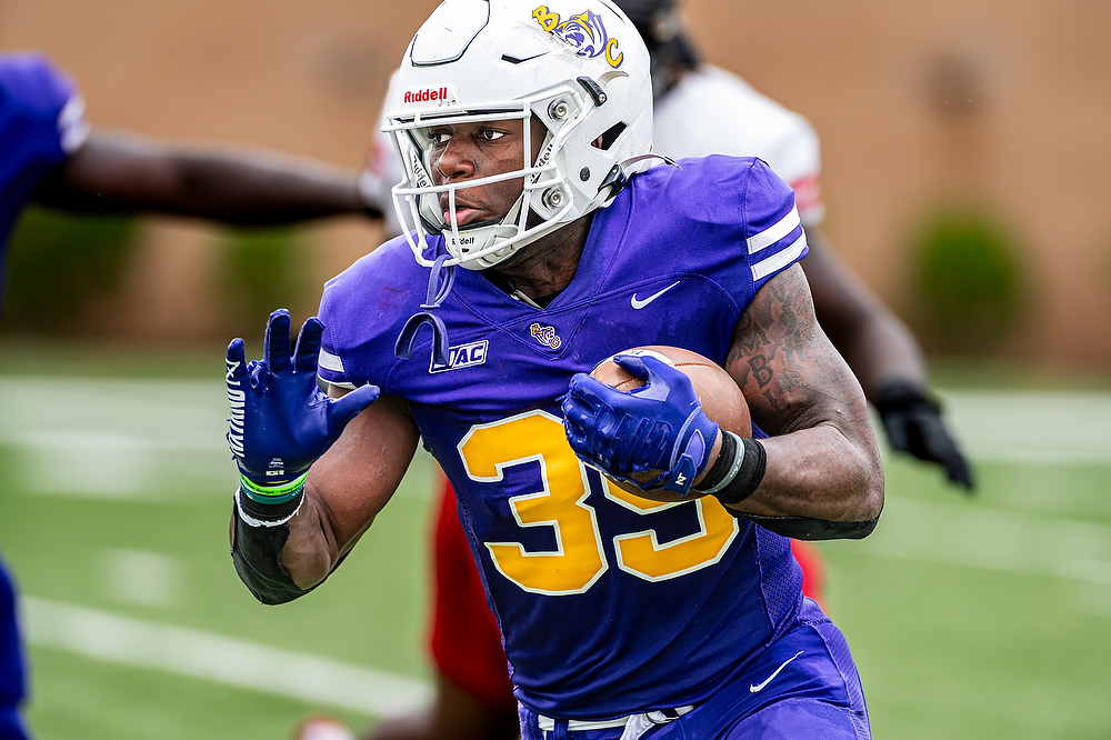 Benedict running back Christopher Johnson (#35) carries the ball against Clark Atlanta