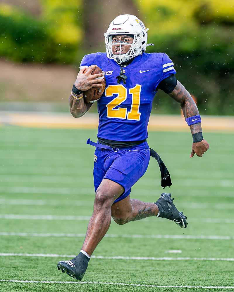 Benedict running back A'chean Durant (#21) carries the ball against Clark Atlanta
