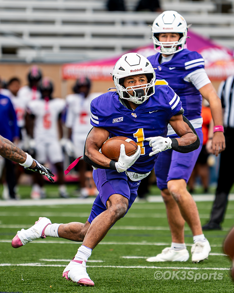 Benedict running back David Smith carries the ball against Edward Waters at Benedict homecoming.