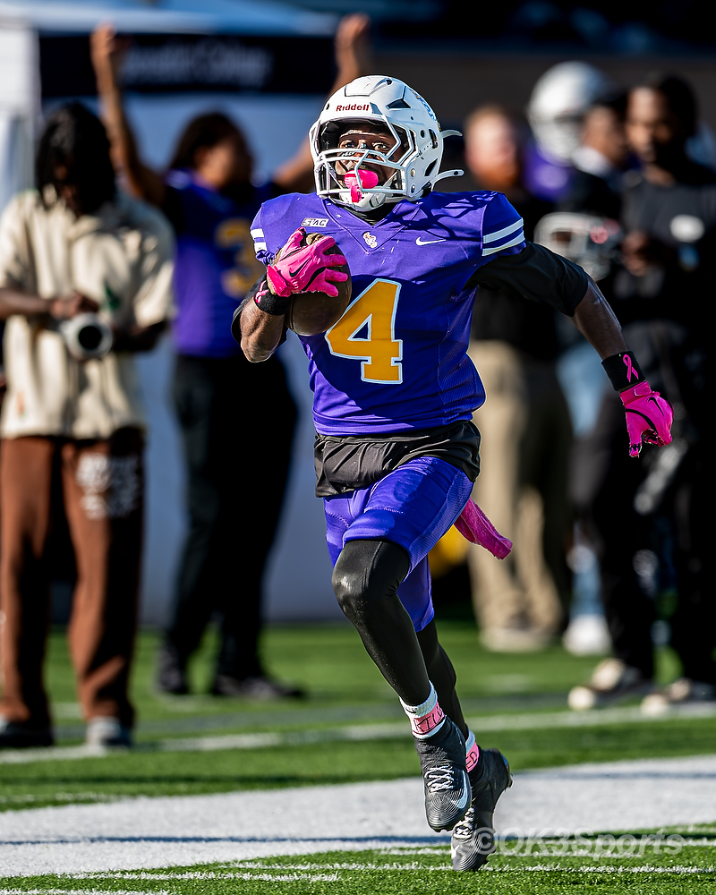 Tigers sophomore Chris Butler returns a kickoff against Edward Waters.