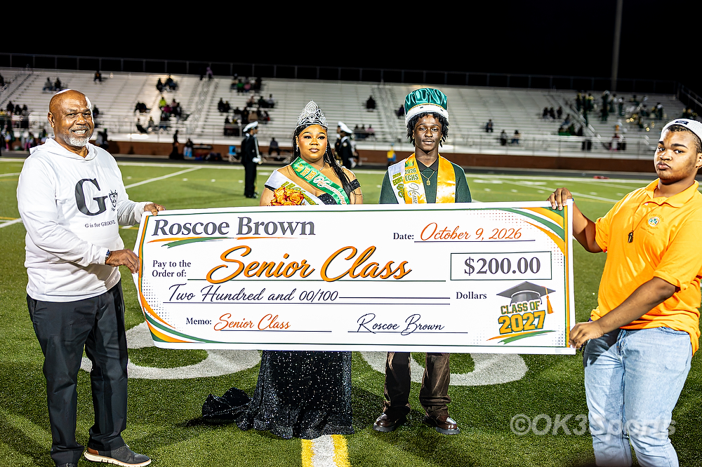 Eau Claire homecoming queen and king presented with a $200 check to the Senior Class